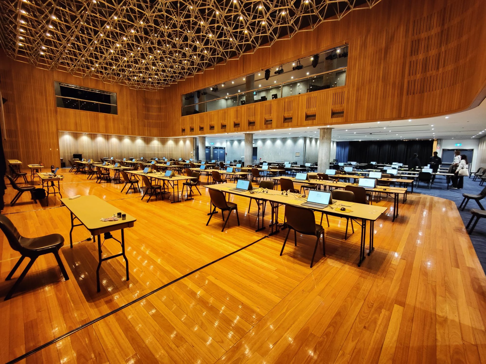 Rows of configured workstations set up and ready at a past D.E. Systems exam site